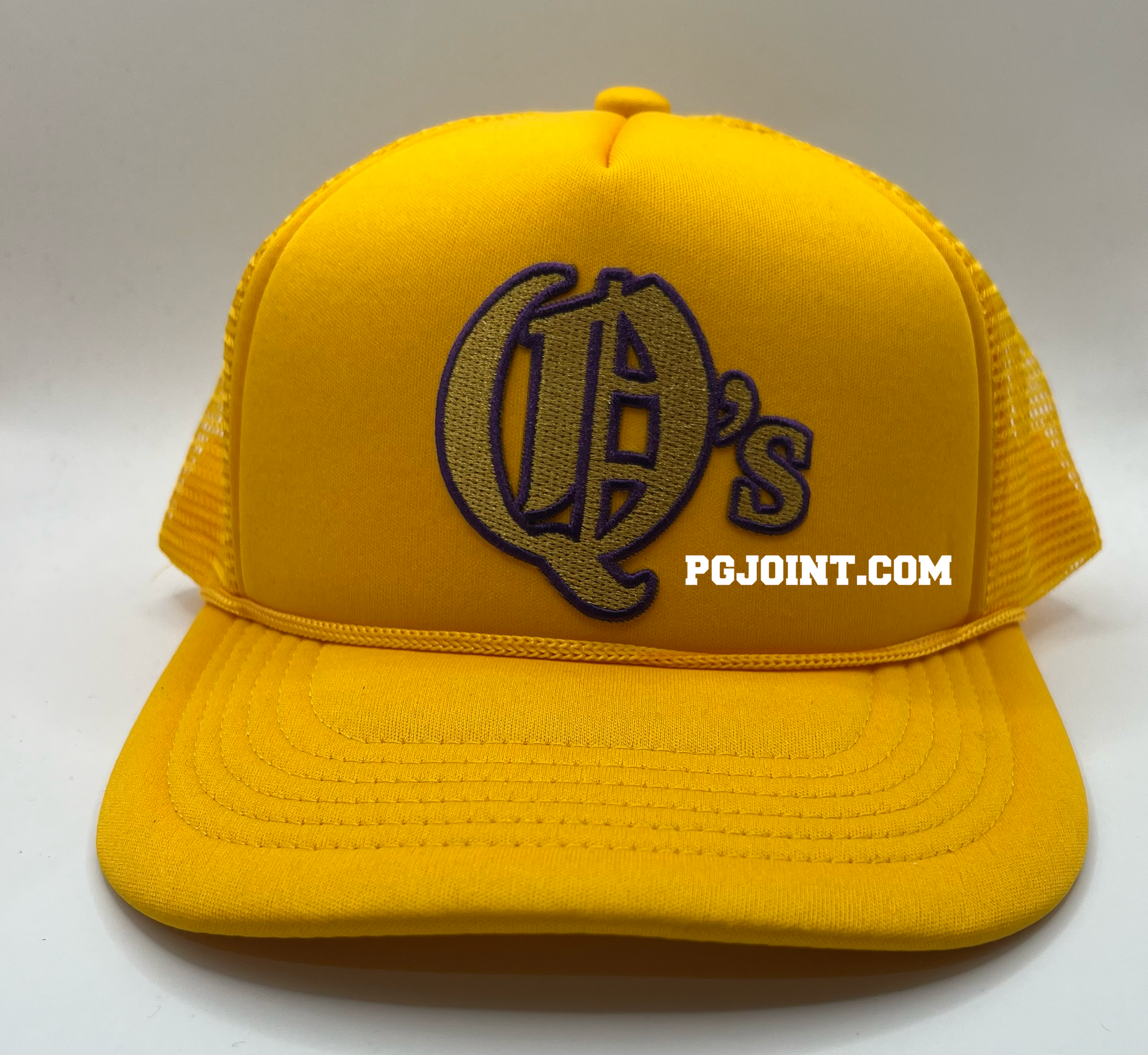 Q’s embroidered hat