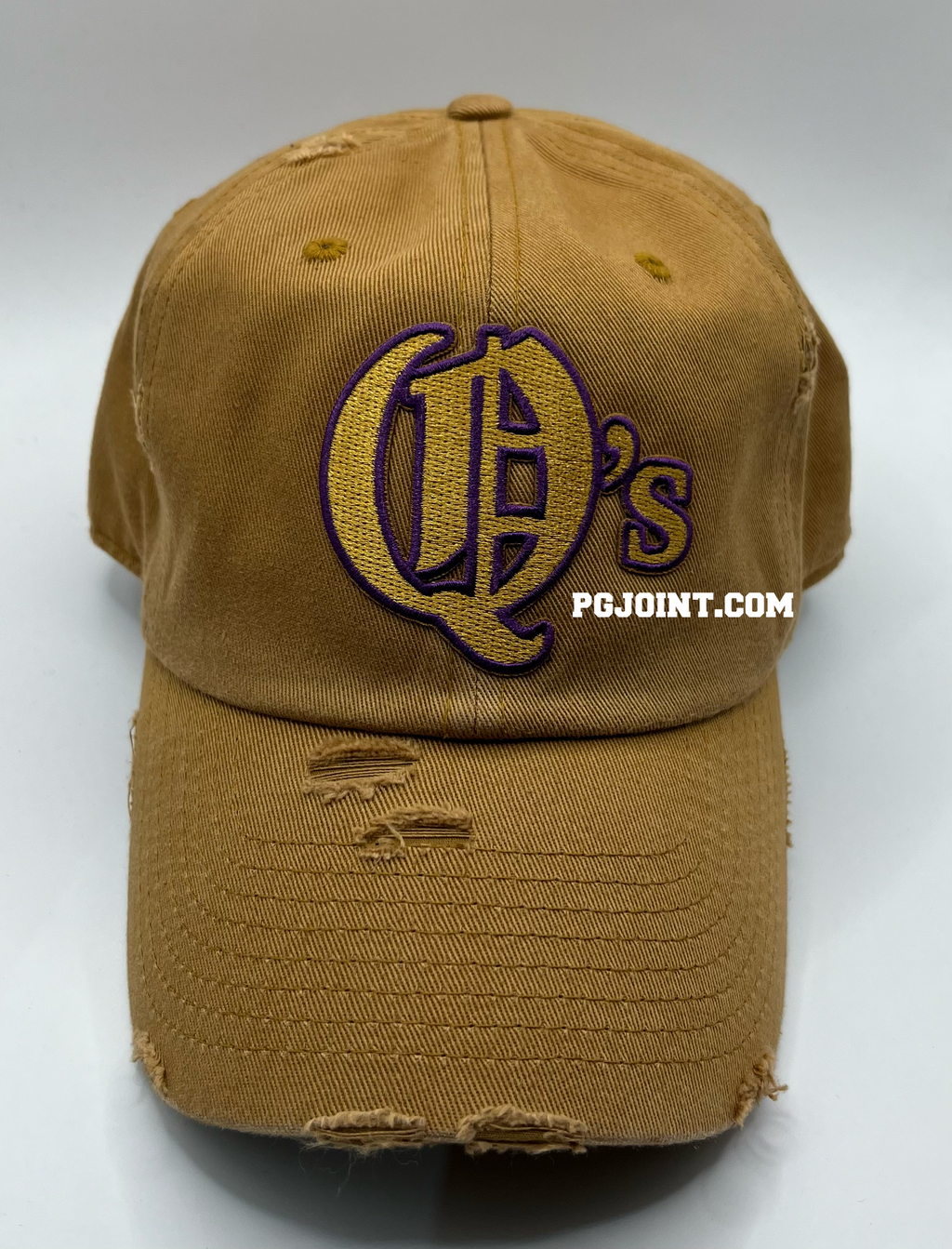 Q’s embroidered hat